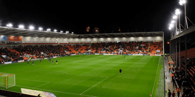 Blackpool football club stadium lit up at night